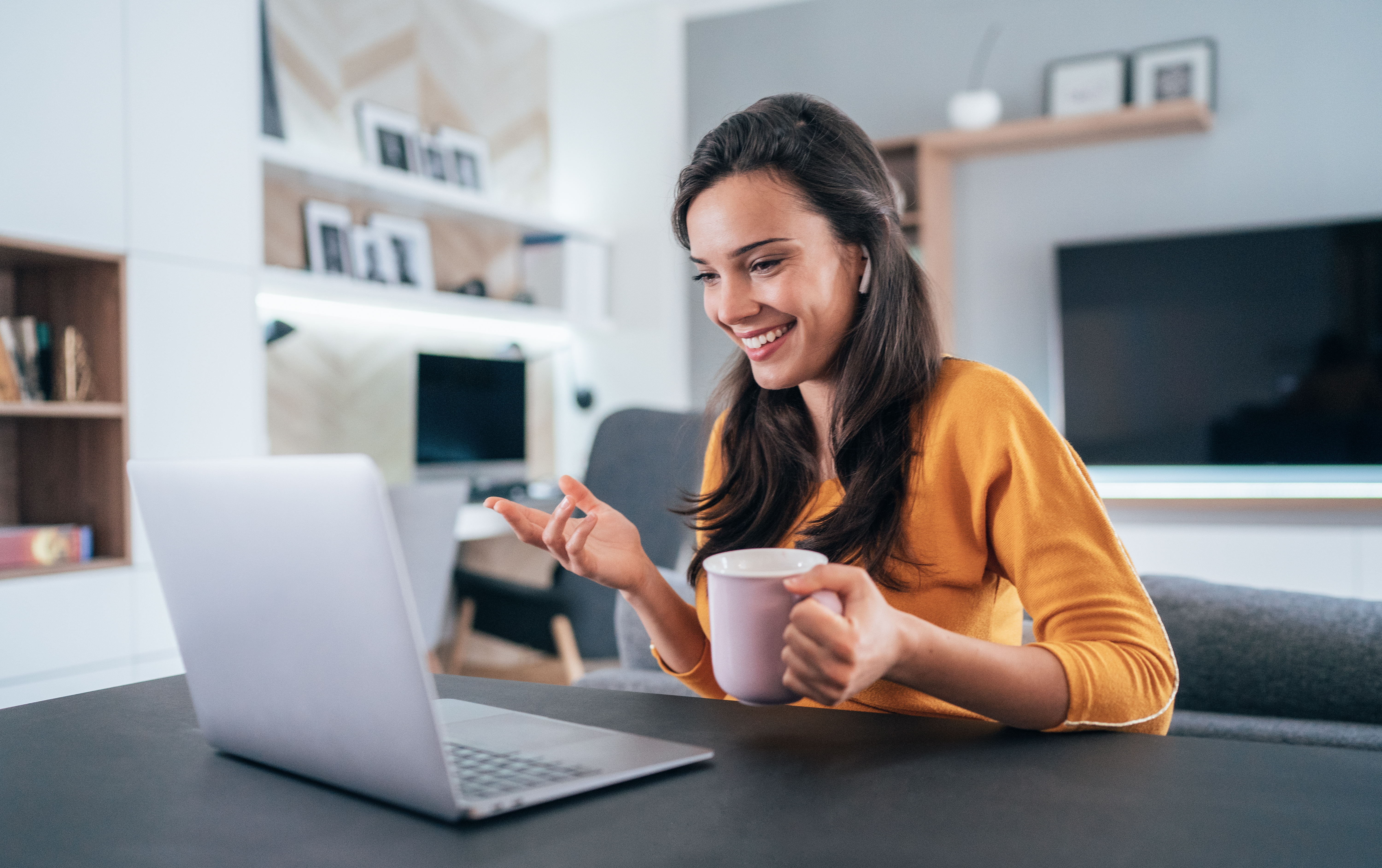 Woman sitting at a computer working