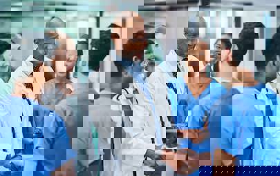 Doctor greeting medical staff Doctor greeting medical staff