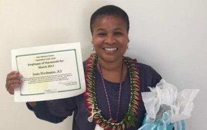 Sonia Washington holding her award Sonia Washington holding her award