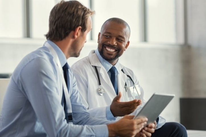physician talking to a patient physician talking to a patient
